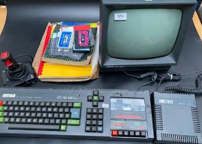A vintage amstrad cpc464 along with amstrad GT64 monitor & accessories