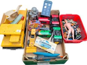 A collection of vintage toys to include Tonka truck, tractors & original action Man figure.