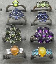 A Lot of eight 925 silver and gem stone rings.