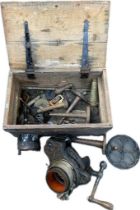 Wooden crate containing an antique knitting machine & accessories