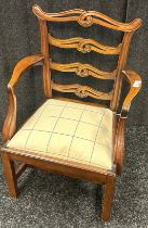 19th century Childs chair, the ladder back above a cushioned upholstered seat, raised on square legs