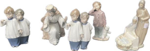 A collection of religious nao figurines [some damaged]