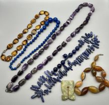 A Selection of vintage bead necklaces; Amethyst bead necklace with silver clasp and catch, Agate and