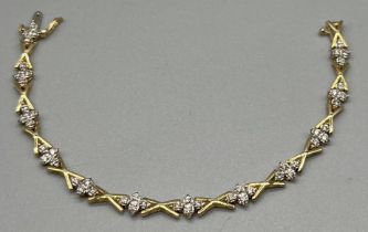 14CT Yellow gold and diamond bracelet. 1.20cts of diamonds. [17.5cm length] [9.55grams]