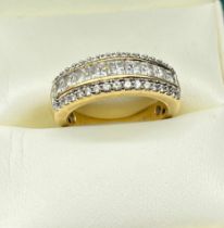 18ct yellow gold ladies ring set with 1ct of diamonds. Baguette and round cut diamonds. [Ring size