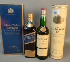 A bottle of Johnny walker blue label scotch whisky with display box together with A bottle of