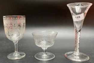 A collection of three Antique glasses; Scottish thistle design air stem glass [18cm]