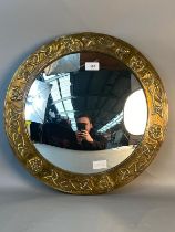 Arts and crafts brass worked framed convex mirror, Celtic design. [46cm]