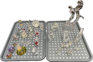 A collection of Swarovski style figures; animal figures & large glass dancers figure