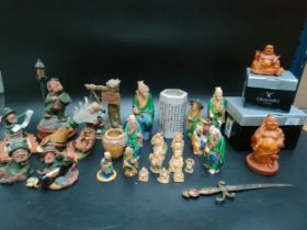 A collection of Guinness advertising figures & oriental figures
