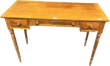 19th century mahogany writing table, the rectangular top above a long central drawer flanked by