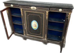 Victorian ebonised, gilt brass & porcelain mounted side cabinet, breakfront outline above a frieze