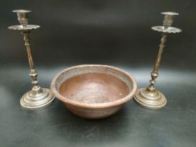 A pair of Anglo Indian white metal candle sticks together with Persian copper bowl [31.5cm]