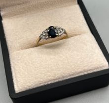 18ct yellow gold, sapphire and diamond ring. [Ring size N] [3.34Grams]