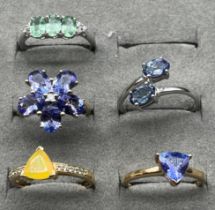 Five various 10ct yellow and white gold gem stone rings. [10ct- 11.68grams]