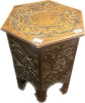 Antique Arts & crafts Liberty style carved oak hexagonal sewing table, with lift top lid. [
