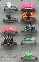 A Lot of Nine 925 silver, opal, fire opal and opalescent stone rings.