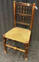 Antique oak chair with rush seat, together with a vintage chair with rattan seat