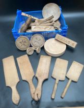 A box of antique wooden butter patters, Scottish wooden thistle moulds