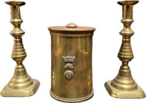 A WWI military trench preserve pot with cover & a pair of brass candle sticks