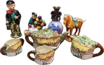 A selection of collectables; Royal doulton the balloon seller (hn1315) A majolica tin glazed horse