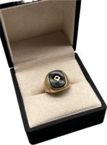 9ct yellow gold and black onyx ring. [Ring size Q] [5.38Grams]