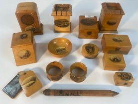 A collection of Mauchline ware; Edinburgh castle from Princess street box , Elgin cathedral St.