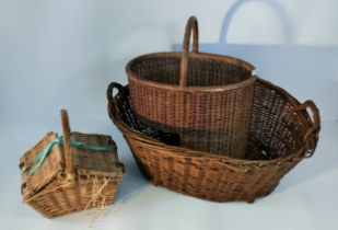 A collection of vintage wicker baskets; a large egg basket