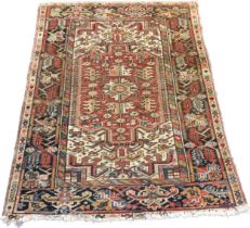 Middle East hand made wool rug, red ground. [180x136cm]