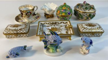 A collection of collectable porcelain; Herend Hungary porcelain angel fish figure, seal figure and