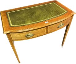 Antique Mahogany bow front writing desk, shaped bow front top fitted with green leather writing