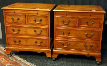 A Pair of Yew wood reproduction small chest of drawers, two small drawers over two long drawers. [