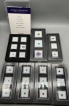 A Collection of mixed gem stones; seven boxes