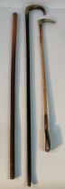 A collection of gentleman's walking cane & military swagger stick; silver hall marked topped swagger