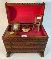 A vintage leather three drawer jewellery chest with contents; brass rocking chair & semi precious