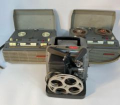 J B bell & Howell movie master projector along with 2 Phillips vintage reel to reels