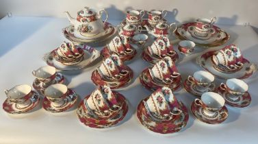 A Royal Albert lady Carlyle pattern 72 piece tea service; tea pots & resting plates