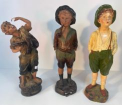 A collection of three art deco chalk boy figures [59cm]