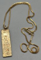 Sheffield 9ct yellow gold ingot pendant with a 9ct yellow gold necklace. [4cm length without