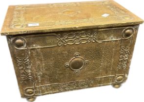 Antique brass worked arts and crafts coal box, has liner present. [36x54x32.5cm]