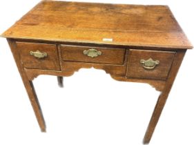 18th century oak desk. three drawers with brass swing handles. [73x78x50cm]