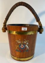 An oak and brass bound vintage fire bucket with rope twist and leather clad handle. Showing Royal