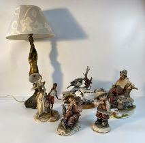 A collection of Capodimonte figures & art nouveau design figural table lamp