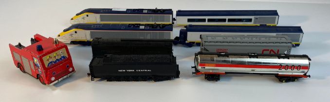 A collection of Hornby trains & carriages & an ertl fireman Sam fire engine model