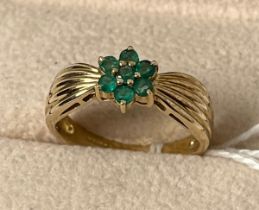 9ct yellow gold ring set with seven round cut emeralds [Ring size Q] [3.47Grams]