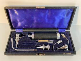 An antique Gollands otoscope medical instruments in fitted case