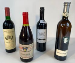 A collection of bottles of wine; Dunfermline football club vin rouge Francais, Château Lanessan 1985