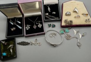 A Collection of silver jewellery; Mackintosh style pendants, earrings and bracelet, Silver and