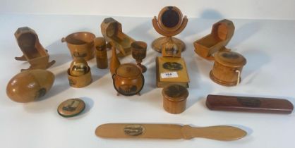 A collection of Mauchline ware; sir Walter Scott's monument Edinburgh small cradle, college church