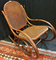 Antique bentwood and bergere rocking chair.